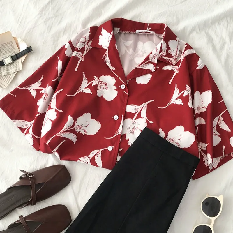 Shortsleeved Blouse With Floral Pattern